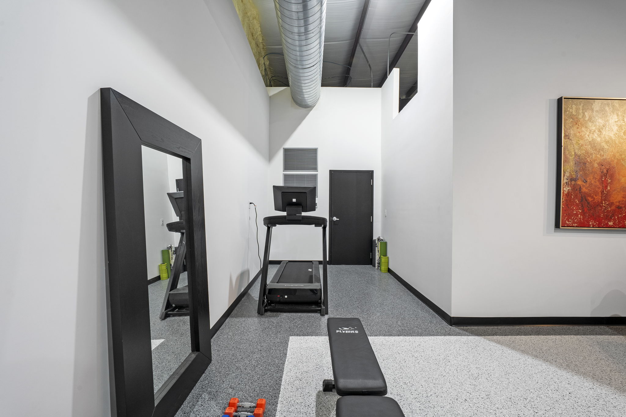 Private fitness area in luxury man cave compound